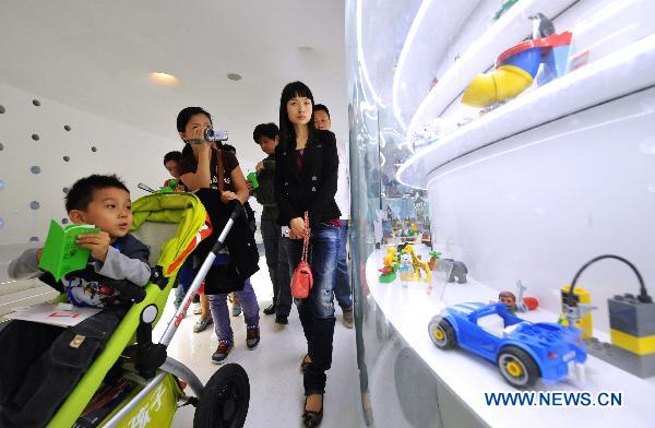Visitors are seen in Danmark pavilion in World Expo Park in east China's Shanghai on Oct. 12, 2010. 