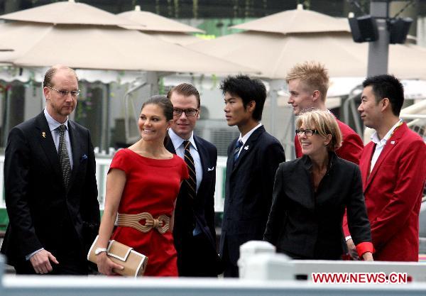 Swedish Crown Princess Victoria (2nd L) walks into the Sweden Pavilion to attend the Sino-Swedish SymbioCare Forum at the World Expo in Shanghai, east China, Oct. 13, 2010. 
