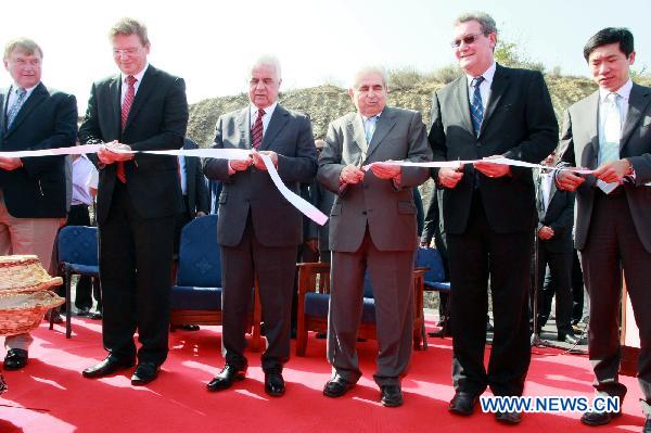 Cyprus President and Greek Cypriot leader Demetris Christofias (3rd R), Turkish Cypriot leader Dervis Eroglu (3rd L), European Union Enlargement Commissioner Stefan Fule (2nd L) and UN Secretary General's special advisor on Cyprus Alexander Downer (2nd R) attend the opening ceremony for the Limnitis/Yesilirmak crossing, the 7th along the 180-km-long UN-controlled buffer zone in Cyprus, Oct. 14, 2010.