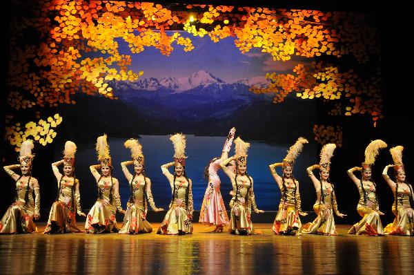 Chinese actresses perform Kazak dance during a large-scale Chinese cultural event termed 'Experience China in Turkey' in Ankara, capital of Turkey, Oct. 17, 2010.
