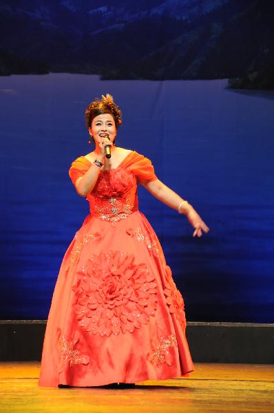 An actress performs a solo during a large-scale Chinese cultural event termed 'Experience China in Turkey' in Ankara, capital of Turkey, Oct. 17, 2010. 