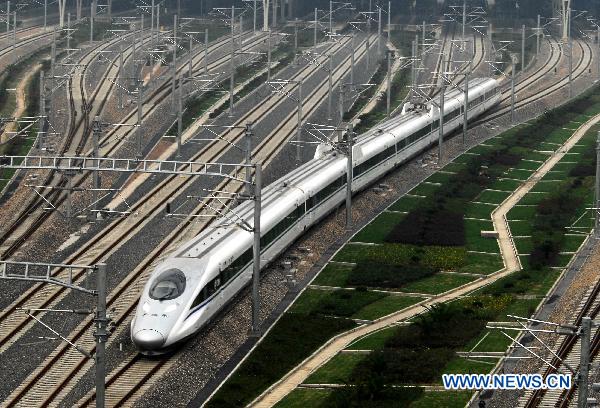 A train runs on Shanghai-Hangzhou High-Speed Railway during its trial operation, in Shanghai, east China, Oct. 18, 2010. 