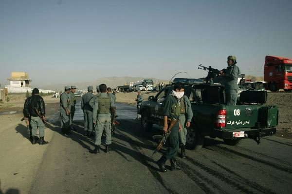 Police secure the site of a blast in Herat, western Afghanistan, on Oct. 18, 2010. 