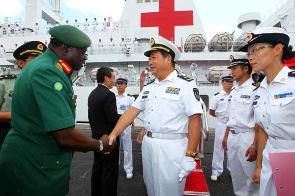 The Chinese navy hospital ship Peace Ark is welcomed on its arrival at Dar es Salaam, the largest city in Tanzania, Oct 19, 2010. 