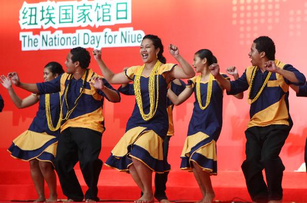 Dancers from Niue perform during a ceremony marking the National Pavilion Day of Niue at the 2010 World Expo in Shanghai, east China, Oct. 19, 2010. 
