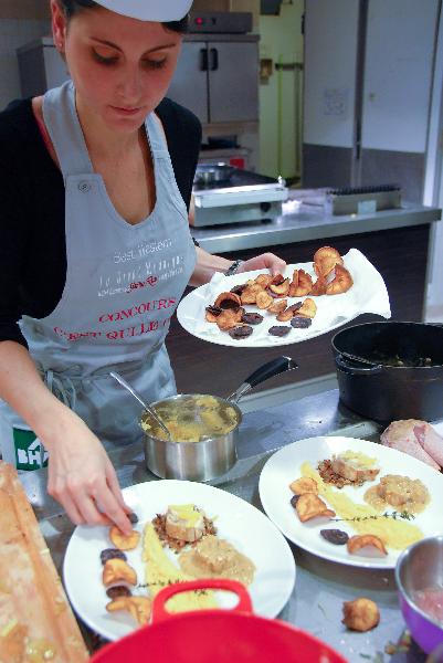 A contestant competes in the 'Who's the Chef?' competition in the Market BHV in Paris, France, Oct. 20, 2010. 