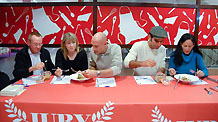 Judges taste the food during the 'Who's the Chef?' competition in the Market BHV in Paris, France, Oct. 20, 2010.