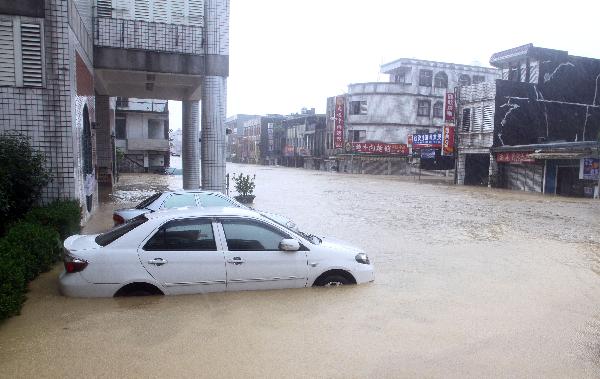Photo taken on Oct. 21, 2010 shows a flooded street in Ilan County, southeast China's Taiwan. Parts of Ilan county suffered from storm-triggered flood as typhoon Megi approached Taiwan on Thursday. 