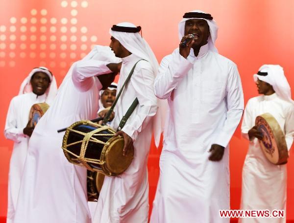 Artists perform during a ceremony marking the National Pavilion Day of Bahrain at the World Expo Park in east China's Shanghai Municipality, Oct. 22, 2010. 
