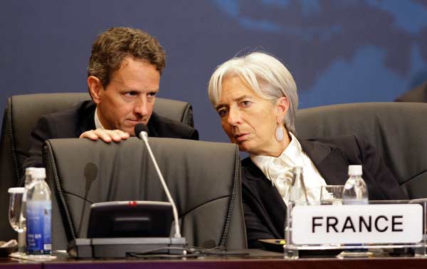 French Economy Minister Christine Lagarde (R) and U.S. Secretary of Treasury Timothy Geithner talk during the G20 finance ministers and central bank governors' meeting held in Gyeongju, South Korea, Oct. 22, 2010.