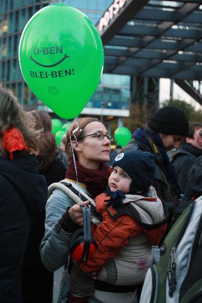 People attend a protest against the Stuttgart 21 underground railway station project in Berlin, Germany, Oct. 26, 2010. 