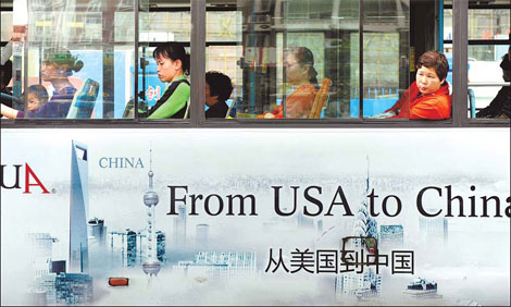 An advertisement on the side of a bus in Fujian Province promotes Sino-US relations. A senior Chinese official on Tuesday said growing US protectionism is damaging bilateral trade relations.
