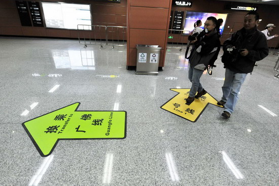 Floor signs in the underground station of China's first intercity underground subway - the Guangzhou-Foshan Line, on Oct 28,2010. 