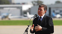 Colombia's President Juan Manuel Santos gives a speech after his arrival to attend the funeral of former President of Argentina Nestor Kirchner, in Buenos Aires, Argentina, Oct. 28, 2010.