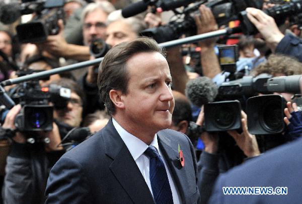 UK's Prime Minister David Cameron arrives at the EU headquarters for European Union Summit in Brussels, capital of Belgium, Oct. 28, 2010.