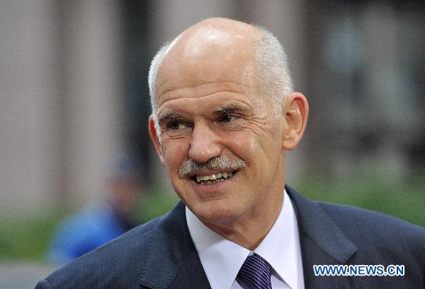 Greek Prime Minister Georgios Papandreou arrives at the EU headquarters for European Union Summit in Brussels, capital of Belgium, Oct. 28, 2010