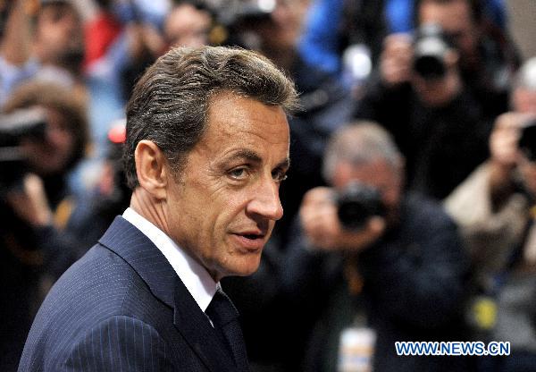 French President Nicolas Sarkozy arrives at the EU headquarters for European Union Summit in Brussels, capital of Belgium, Oct. 28, 2010.