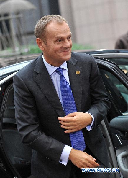 Polish Prime Minister Donald Tusk arrives at the EU headquarters for European Union Summit in Brussels, capital of Belgium, Oct. 28, 2010. 