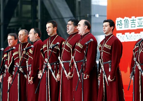 Artists from Georgia perform during a ceremony marking the National Pavilion Day for Georgia at the 2010 Shanghai World Expo, in Shanghai, east China, Oct. 28, 2010.