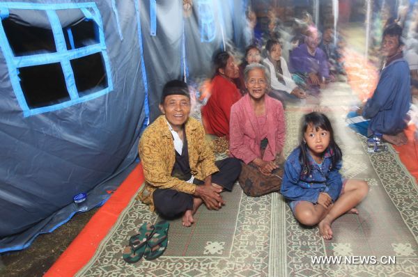 Refugees are seen at a temporary camp in Yogyakarta, Central Java, Indonesia, Oct. 31, 2010. 
