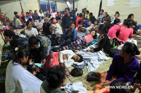 Refugees are seen at a temporary camp in Yogyakarta, Central Java, Indonesia, Oct. 31, 2010. 