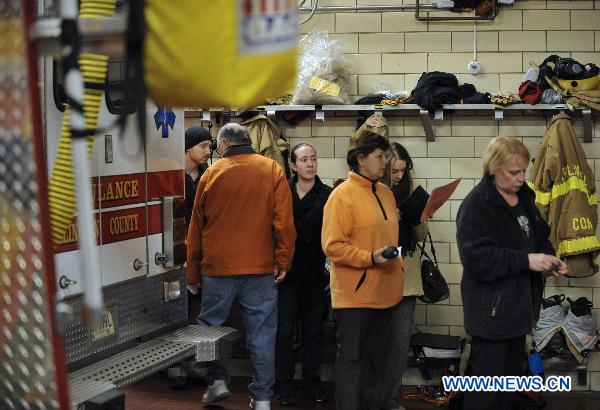 People wait to cast their votes at a polling station in Arlington, Virginia, the United States, Nov. 2, 2010, the US Midterm Election Day.