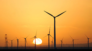 Wind turbines are seen at Guazhou Wind Farm in Jiuquan, northwest China's Gansu Province, Nov 3, 2010.