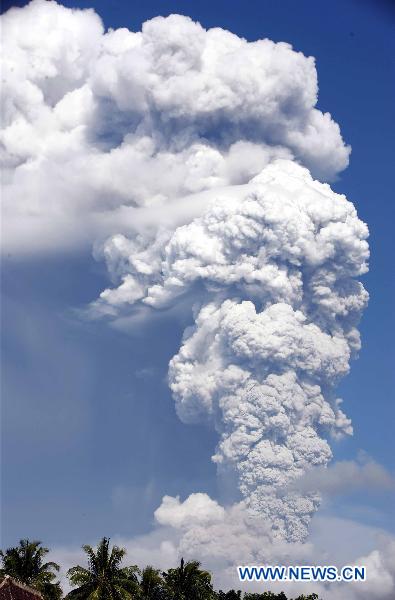 Photo taken on Nov. 4, 2010 shows Merapi volcano spewing lava and smoke as it erupted again, near the ancient city of Yogyakarta, Indonesia.