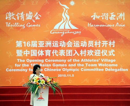 Kong Shaoqiong, head of the Asian Games Athletes Village, speaks during the opening ceremony of Athletes Village in Guangzhou, Nov 5, 2010.