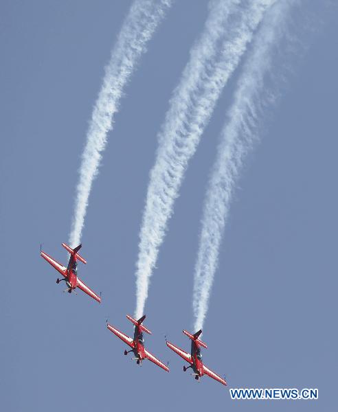 An aerobatic team performs during the AVEX International Air Show at the Sharm El Sheikh airport, Egypt, Nov. 8, 2010.
