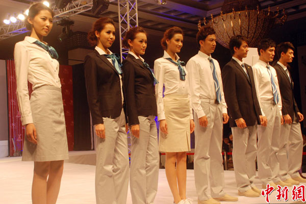 Five official uniforms for 16th Guangzhou Asian Games make their debut at Dong Fang Hotel in Guangzhou, southeast China&apos;s Guangdong Province, Nov 7, 2010. 