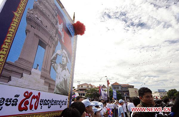 People attend a ceremony to celebrate the 57th anniversary of independence of Cambodia in Phnom Penh, on Nov. 9, 2010.