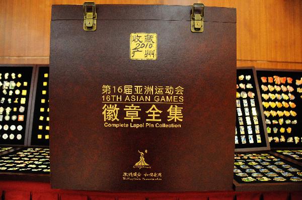 The Complete Lapel Pin Collection for the 16th Asian Games is released in Guangzhou, south China's Guangdong Province, Nov. 10, 2010. 