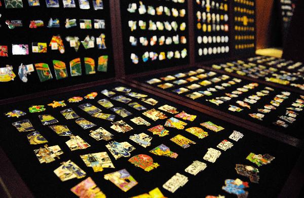 The Complete Lapel Pin Collection for the 16th Asian Games is released in Guangzhou, south China's Guangdong Province, Nov. 10, 2010.