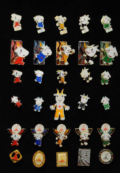 The Complete Lapel Pin Collection for the 16th Asian Games is released in Guangzhou, south China's Guangdong Province, Nov. 10, 2010. 