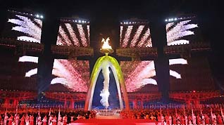 Main cauldron is lightened during the art performance of opening ceremony at the 16th Asian Games at the Haixinsha Island in Guangzhou, China, Nov. 12, 2010.