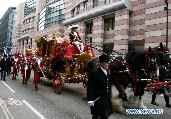 The Lord Mayor&apos;s chariot is seen during the Lord Mayor&apos;s Show in the City of London, capital of Britain, Nov. 13, 2010. The 683rd Lord Mayor of London Michael Bear started his first duty in his one-year term by embarking on the procession on Saturday. The annual street parade is one of the best known events in London dating back to 1215. [Xinhua] 