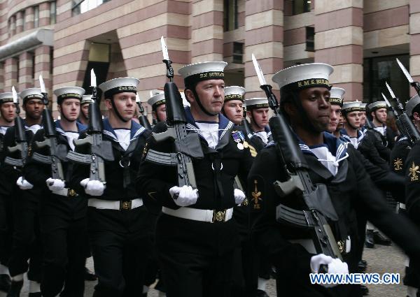 Soldiers march during the Lord Mayor&apos;s Show in the City of London, capital of Britain, Nov. 13, 2010.