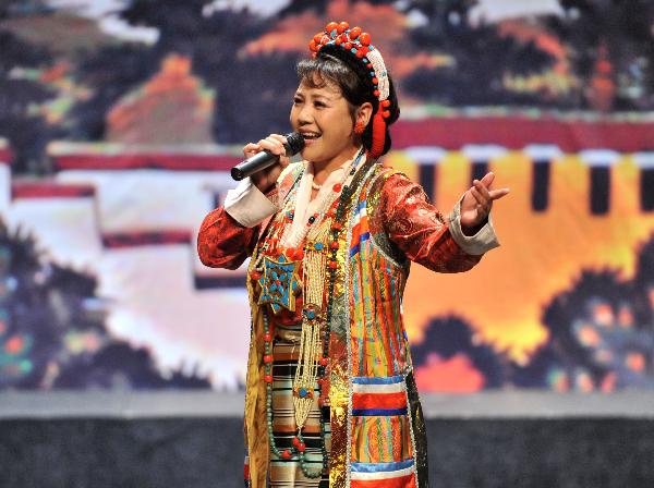 Tibetan singer Gaesang Qoezhoen performs during a show of Tibetan music and dance in Spanish capital Madrid Nov. 15, 2010.