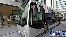 A BYD K9 Full Automatic Coach stops at the 2010 Changsha Science and Technology Achievements Transformation Fair in Changsha, capital of central China's Hunan Province, Oct. 11, 2010.