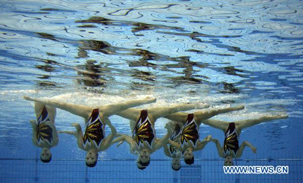 Team Japan perform during the women's synchronised swimming team free routine final at the 16th Asian Games in Foshan, south China's Guangdong Province, Nov. 20, 2010. 