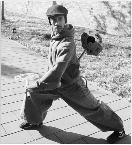 Che Garcia practices with a pair of weapons he had specially made, based on an old design his tai chi master described. 