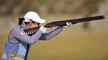 Wei Ning of China competes during the competition of Women's Skeet Team of shooting at the 16th Asian Games in Guangzhou, south China's Guangdong Province, Nov. 23, 2010. The team of China claimed the title.