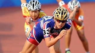 Huang Yu Ting(front) of Chinese Taipei competes during the women's 500m sprint race final of Roller Sports at the 16th Asian Games in Guangzhou, south China's Guangdong Province, Nov. 23, 2010. Huang won the champion with 44.850 seconds.