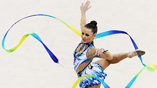 Ulyana Trofimova of Uzbekistan performs during the individual all-around event of Rhythmic Gymnastics at the 16th Asian Games in Guangzhou, south China's Guangdong Province, Nov. 26, 2010.