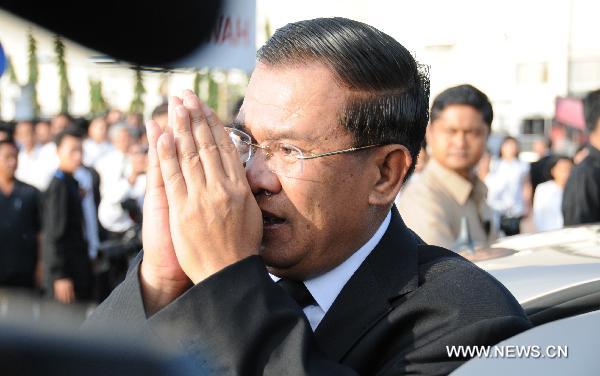 Cambodian Prime Minister Hun Sen attends the mourning ceremony for stampede victims on the national day of mourning in Phnom Penh Nov. 25, 2010.