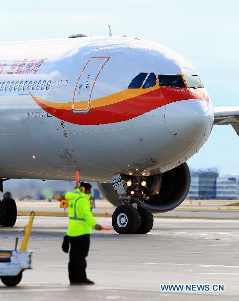 Hainan Airlines' A340-600 passenger plane lands at Pearson International Airport in Toronto, Canada, Nov. 27, 2010.