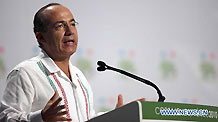 Mexican President Felipe Calderon addresses the opening session of the United Nations Climate Change Conference (COP-16) in Cancun, Mexico, Nov. 29, 2010.