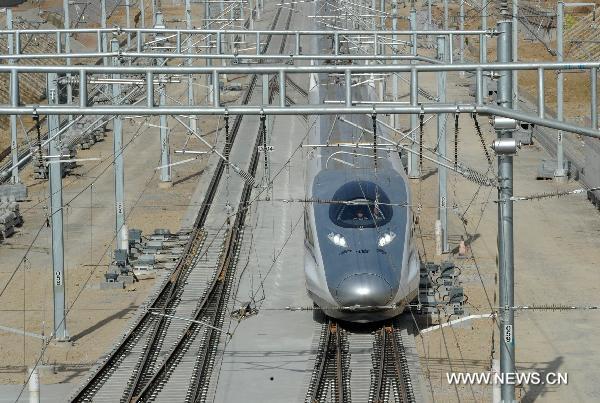 The train CRH380A of China Railway High-Speed (CRH) enters Bengbu south railway station, a stop in Anhui Province on the Beijing-Shanghai high-speed rail line, Dec. 3, 2010.