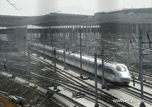 The train CRH380A of China Railway High-Speed (CRH) arrives at the Bengbu south railway station, a stop in Anhui Province on the Beijing-Shanghai high-speed rail line, Dec. 3, 2010. 
